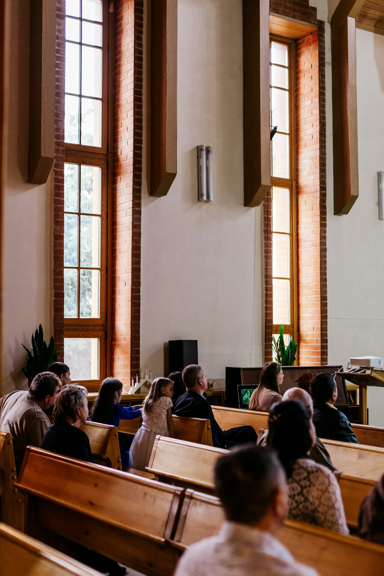 A family sitting together in a church pew